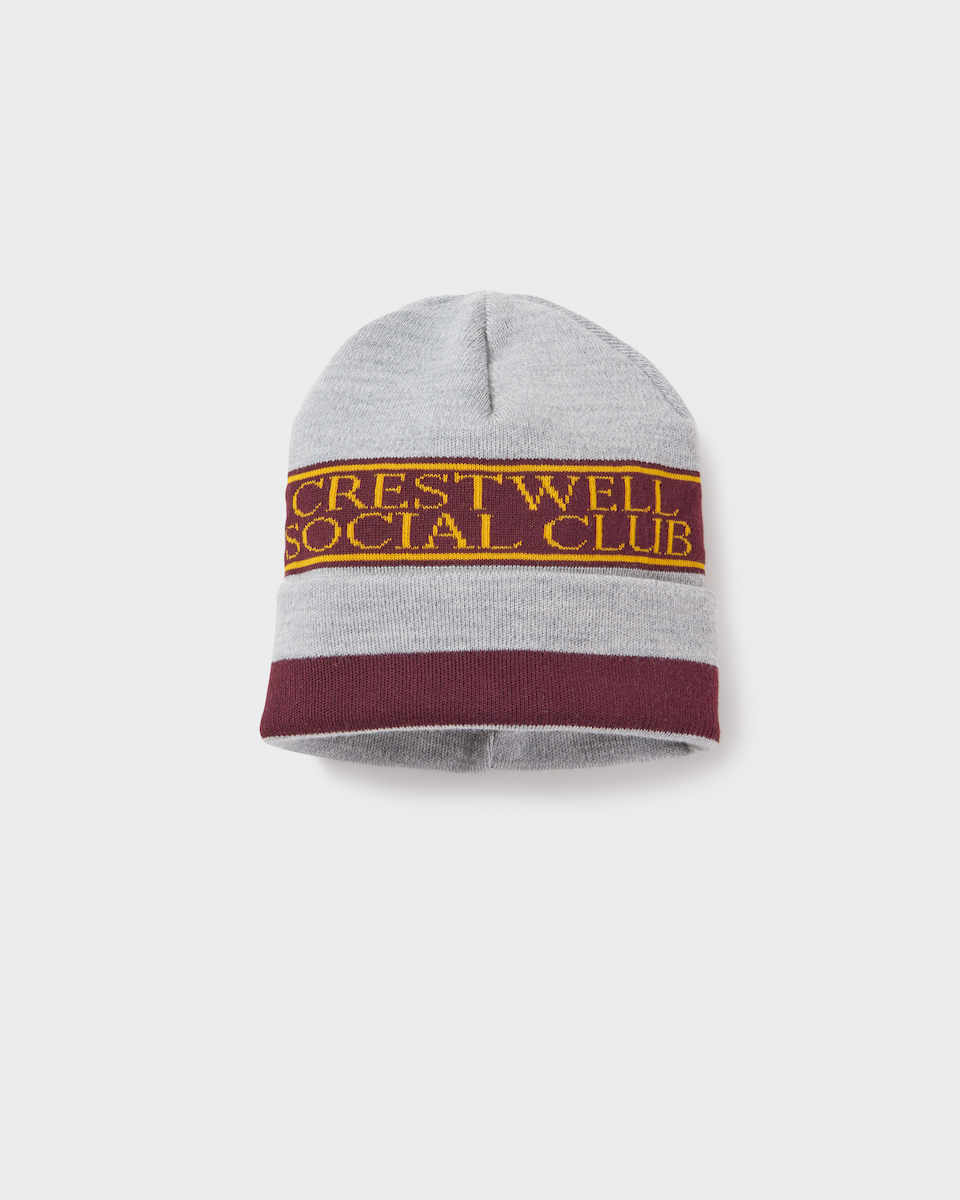 Beanie in grey, burgundy and gold.